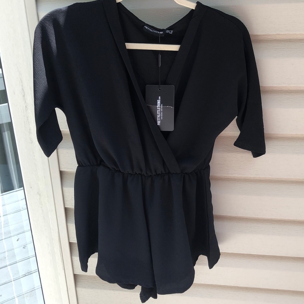 romper size 4 , never worn, perfect condition
